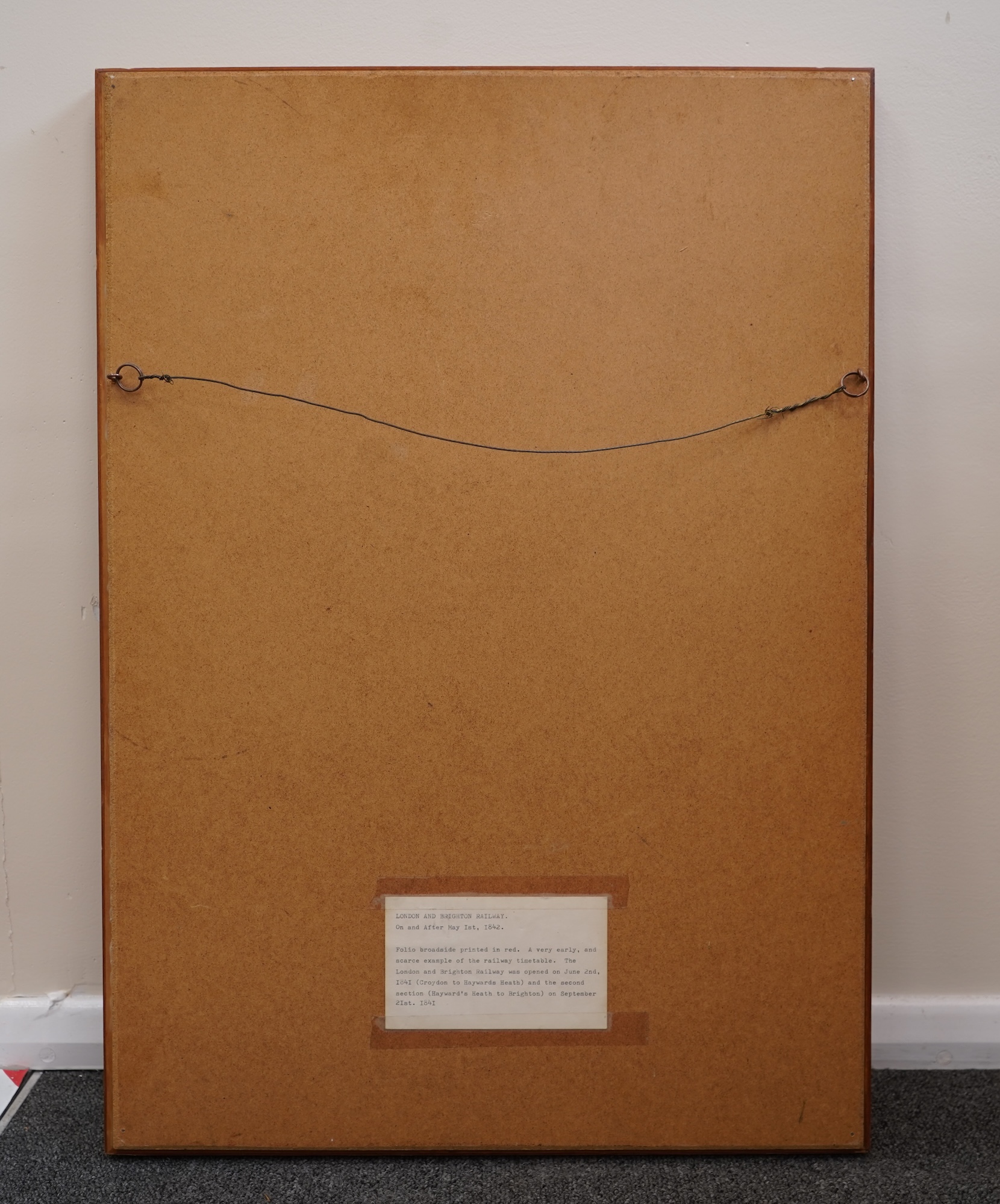 A framed London and Brighton railway timetable ‘On and after May the 1st, 1842’ including the Shoreham branch line at the bottom of the page, in a walnut frame, dimensions of the frame 62 x 44cm
